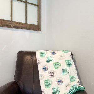 Cafe du Monde towel lying on a leather chair