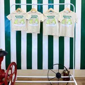 Four Cafe du Monde Beignets, Please! Toddler Shirts on hangers